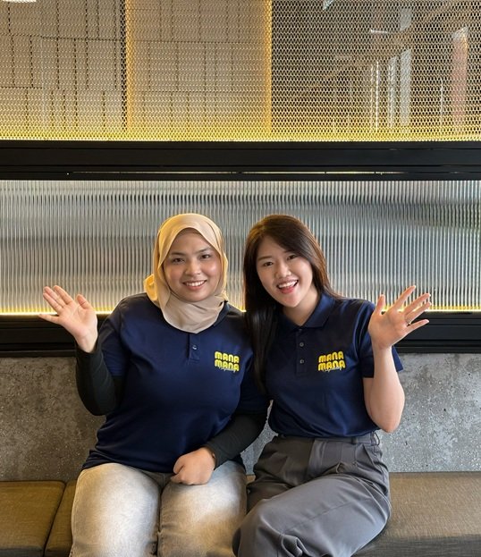 Mana Mana team members at work
